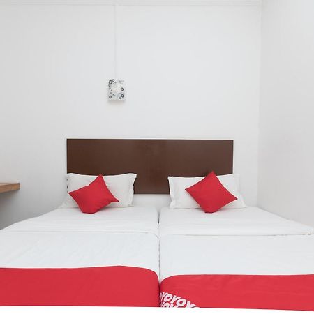 Super Oyo 218 Storytel Hotel Kota Kinabalu Bagian luar foto